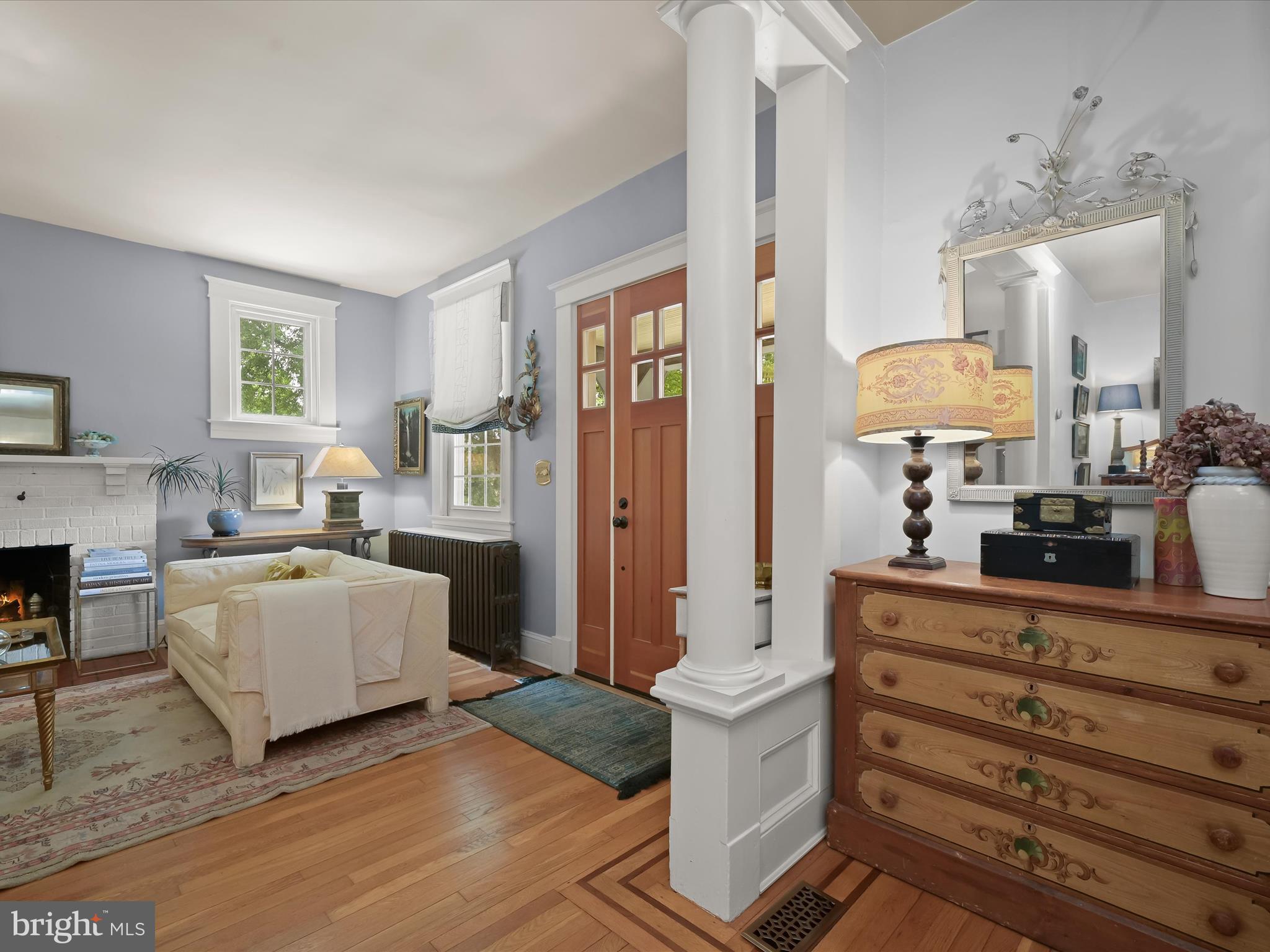 112 Park Drive Baltimore, MD 21228 - Photo 11 of 86 a living room with furniture and a fireplace