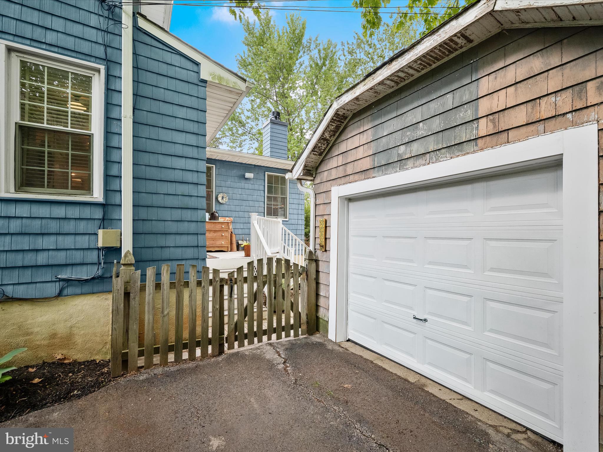 112 Park Drive Baltimore, MD 21228 - Photo 55 of 86 a front view of a house with a garage