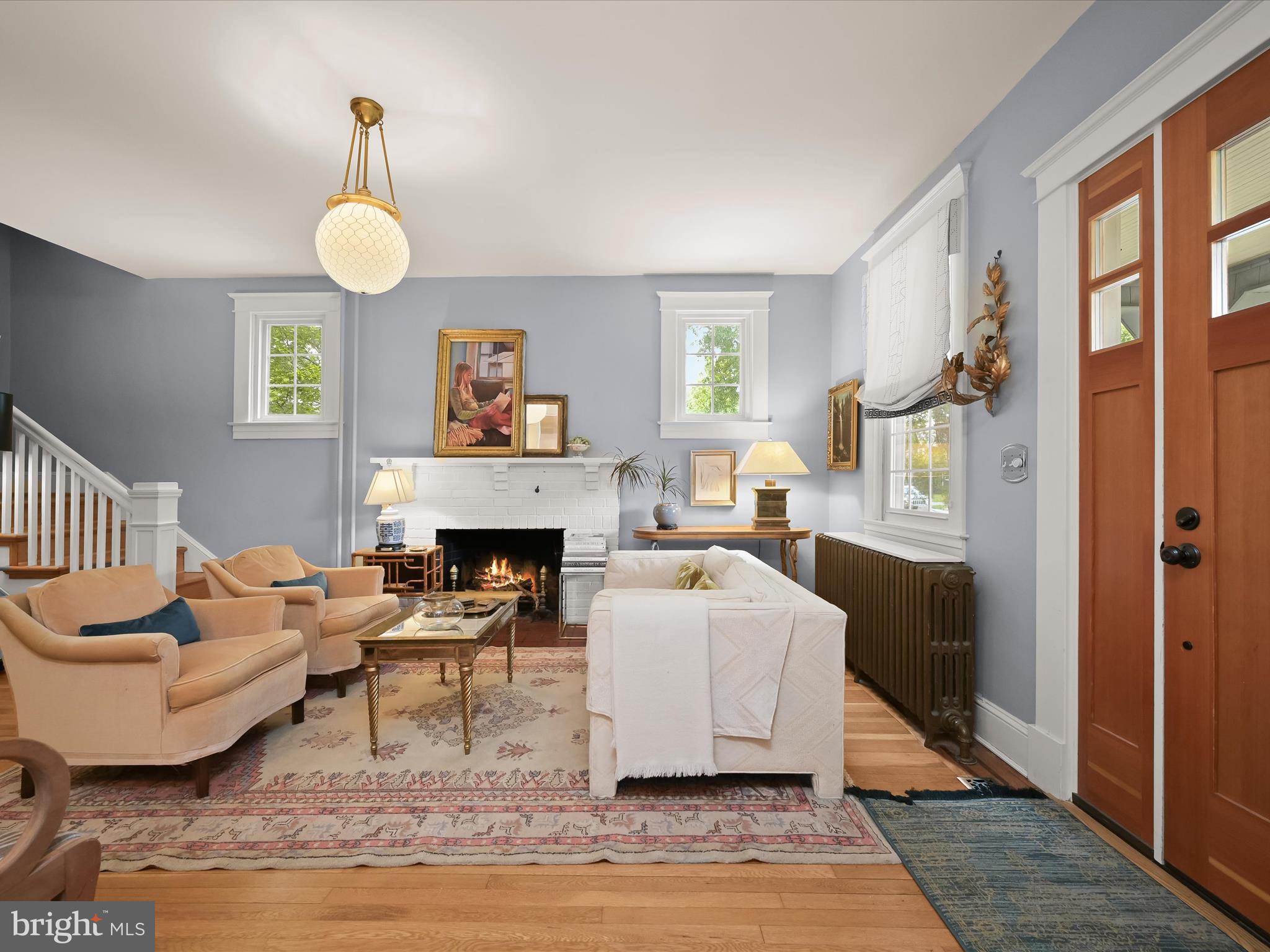 112 Park Drive Baltimore, MD 21228 - Photo 8 of 86 a living room with furniture and a fireplace