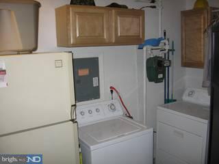 42 Paul Road Maple Shade, NJ 08052 - Photo 6 of 6 a utility room with dryer and washer