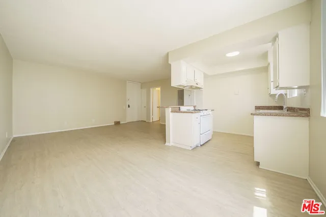 a view of kitchen and sink