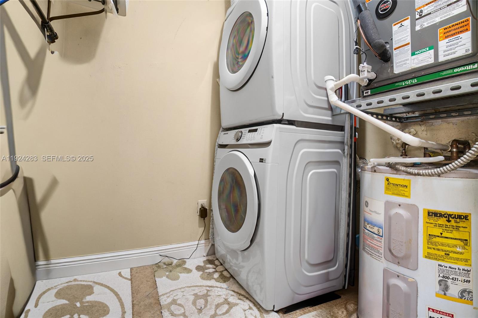 4605 Southwest 139th Court, Unit 814 Miami, FL 33175 - Photo 17 of 27 a utility room with dryer and washer