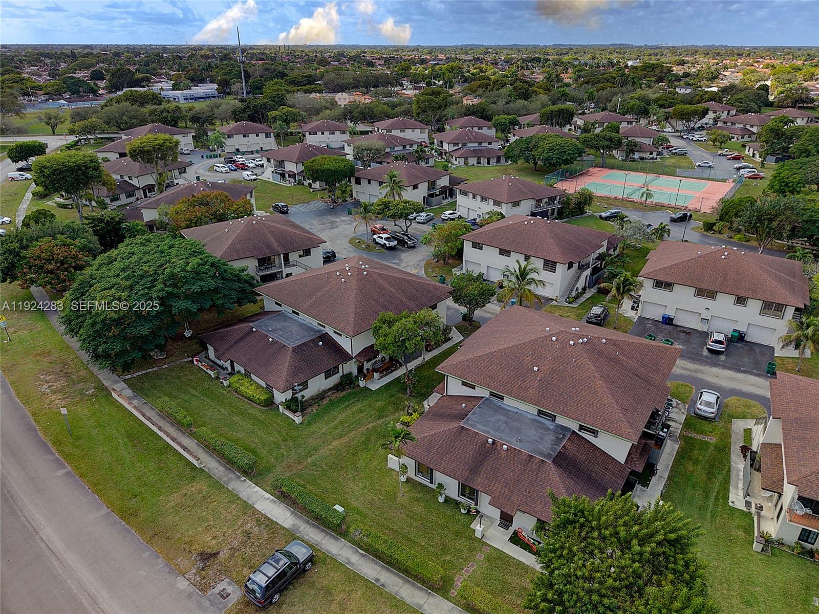 4605 Southwest 139th Court, Unit 814 Miami, FL 33175 - Photo 24 of 27 an aerial view of residential houses with outdoor space