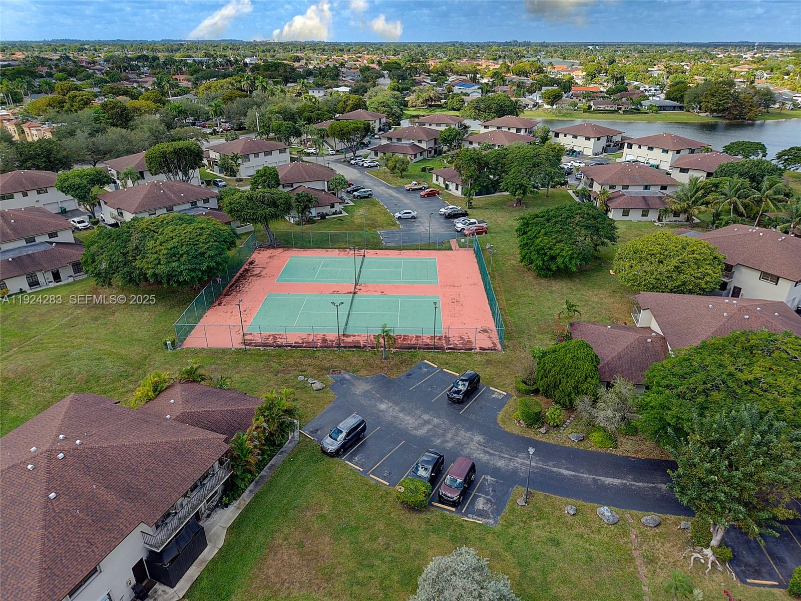 4605 Southwest 139th Court, Unit 814 Miami, FL 33175 - Photo 25 of 27 an aerial view of residential houses with outdoor space and street view