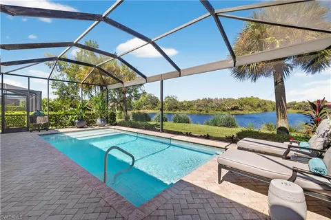 a view of swimming pool with a patio