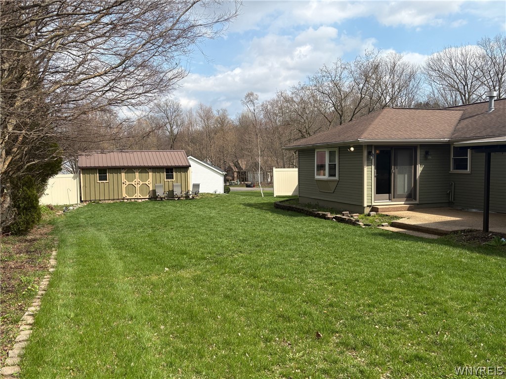 8421 Forest Road Royalton, NY 14067 - Photo 18 of 35 Access From Family Room to the Open Patio