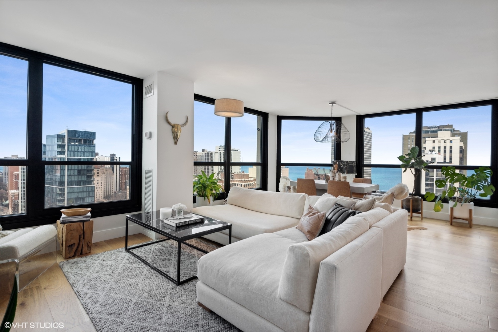 1030 North State Street, Unit 21E Chicago, IL 60610 - Photo 2 of 42 a living room with furniture and a large window
