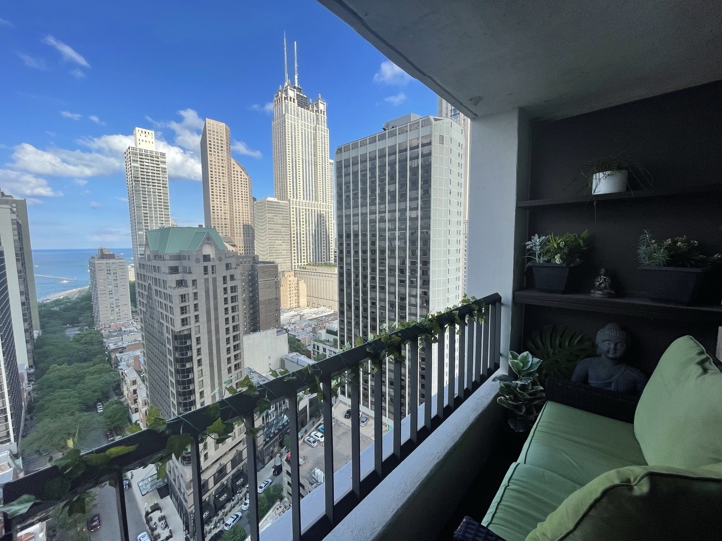 1030 North State Street, Unit 21E Chicago, IL 60610 - Photo 26 of 42 a view of a balcony with two chairs