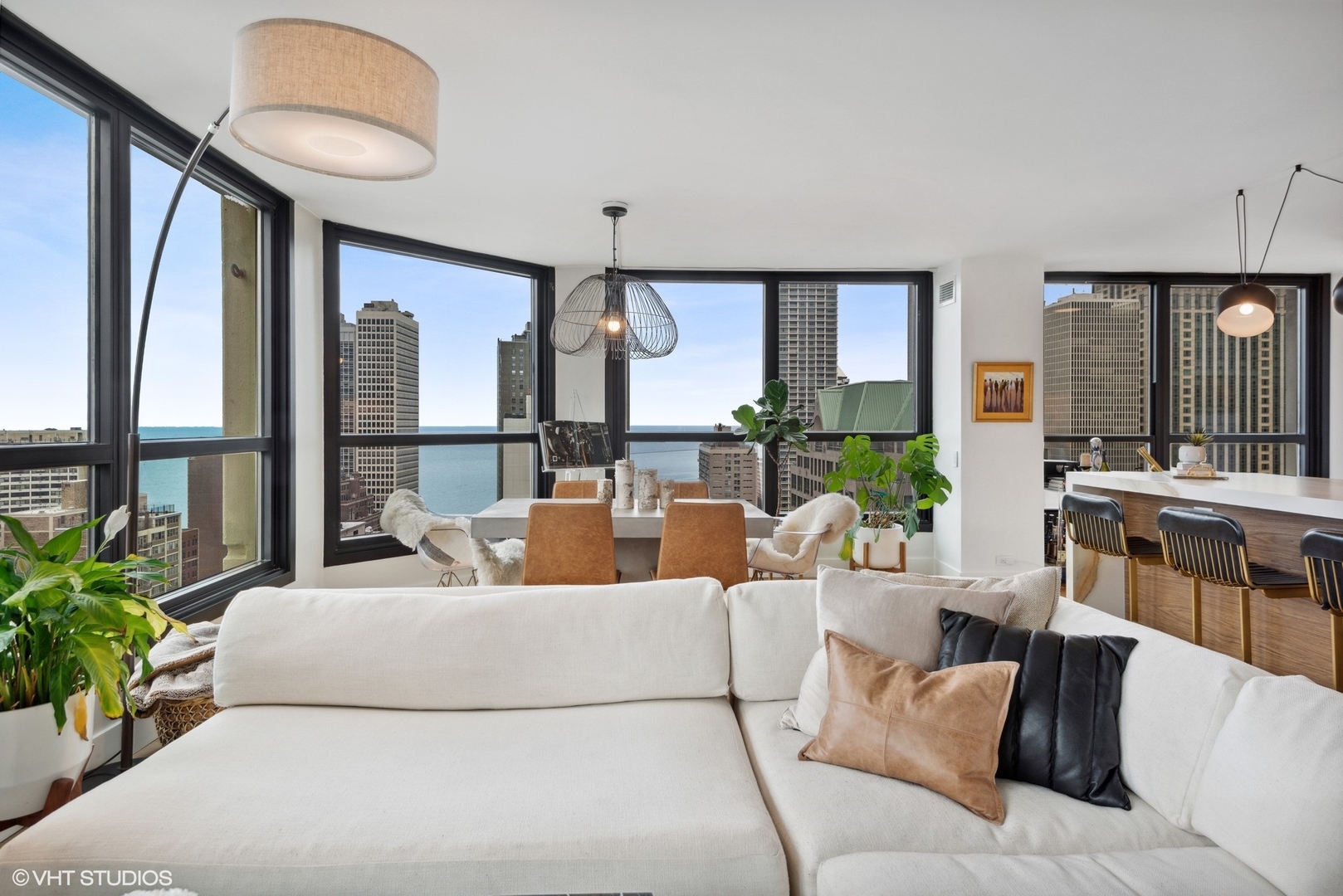 1030 North State Street, Unit 21E Chicago, IL 60610 - Photo 6 of 42 a living room with furniture and large windows