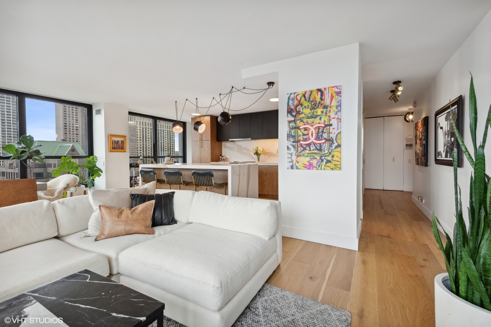 1030 North State Street, Unit 21E Chicago, IL 60610 - Photo 7 of 42 a living room with furniture and a large window