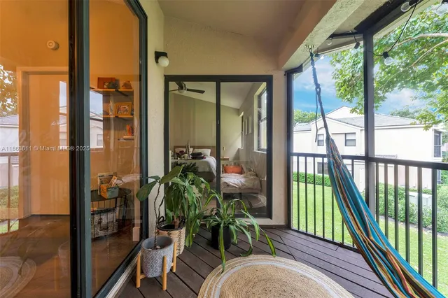 a view of balcony with furniture