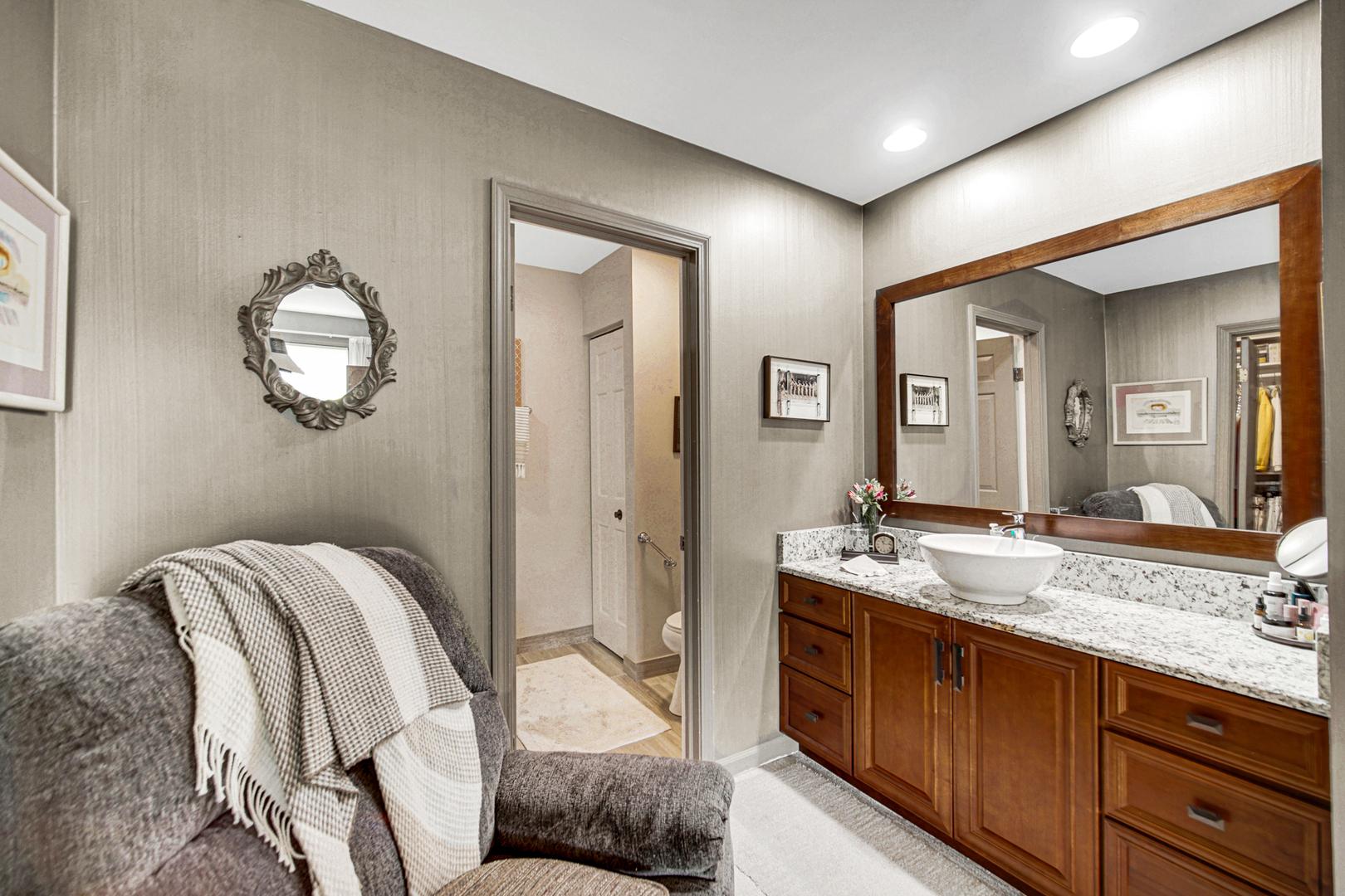 4000 Dundee Road, Unit 302 Northbrook, IL 60062 - Photo 7 of 12 a bedroom with a bed and wooden floor