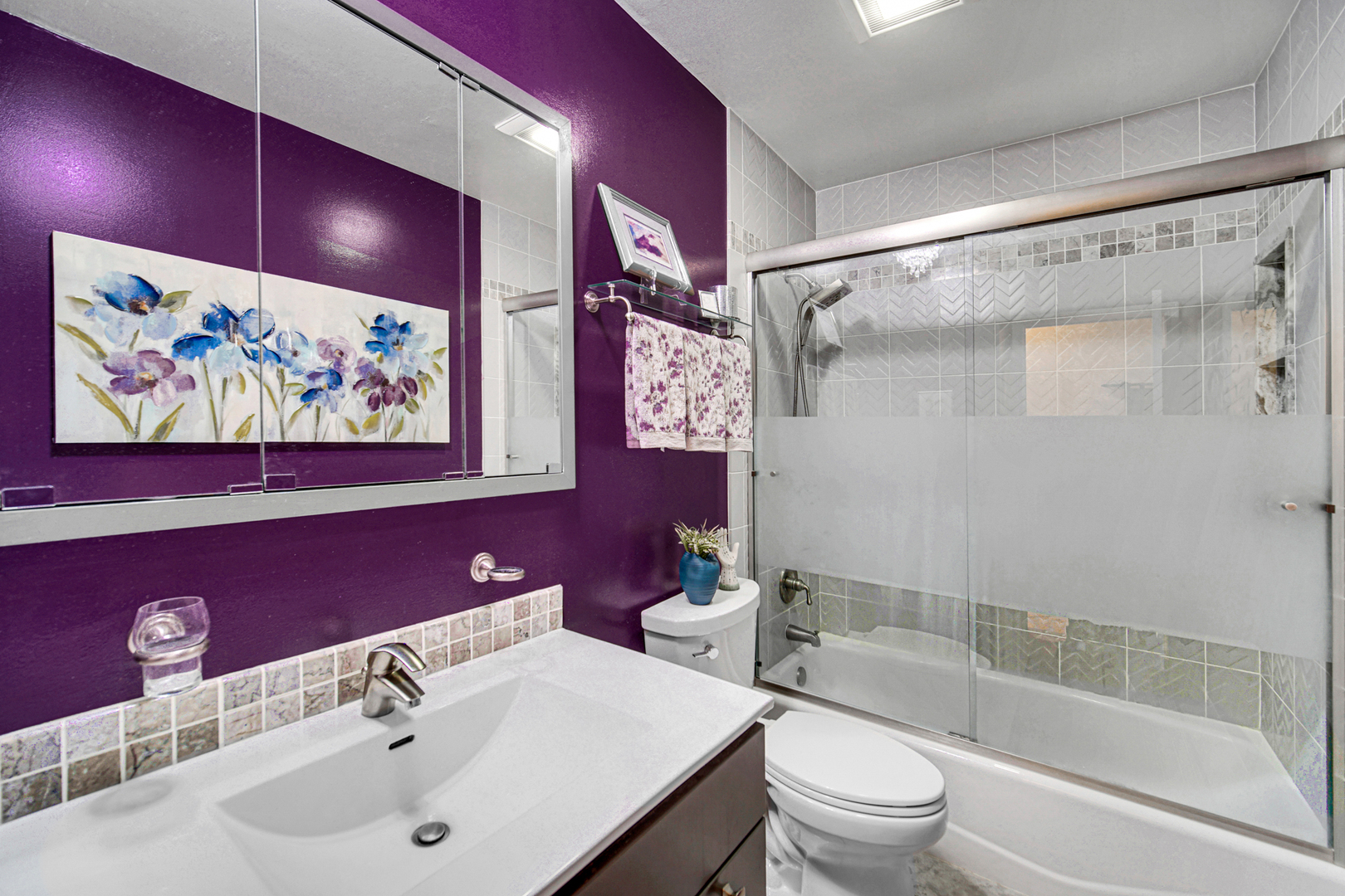 4000 Dundee Road, Unit 302 Northbrook, IL 60062 - Photo 10 of 12 a bathroom with a sink a toilet and shower