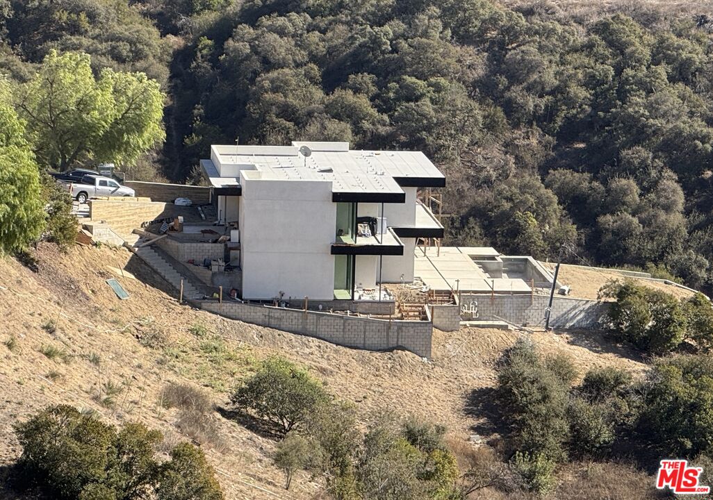 2551 Old Topanga Canyon Road Topanga, CA 90290 - Photo 1 of 28 a view of a house with pool and chairs
