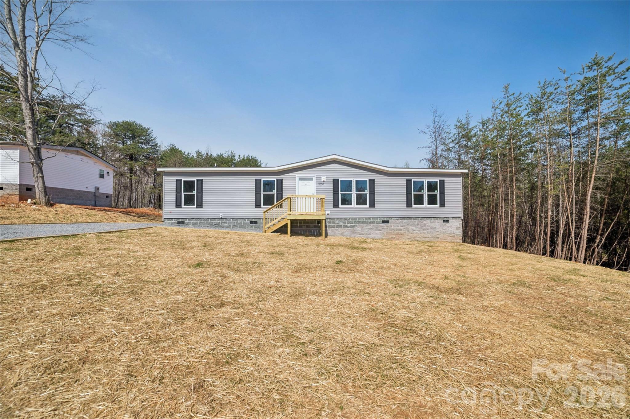 5350 Hope Road Vale, NC 28168 - Photo 1 of 24 a house view with a outdoor space