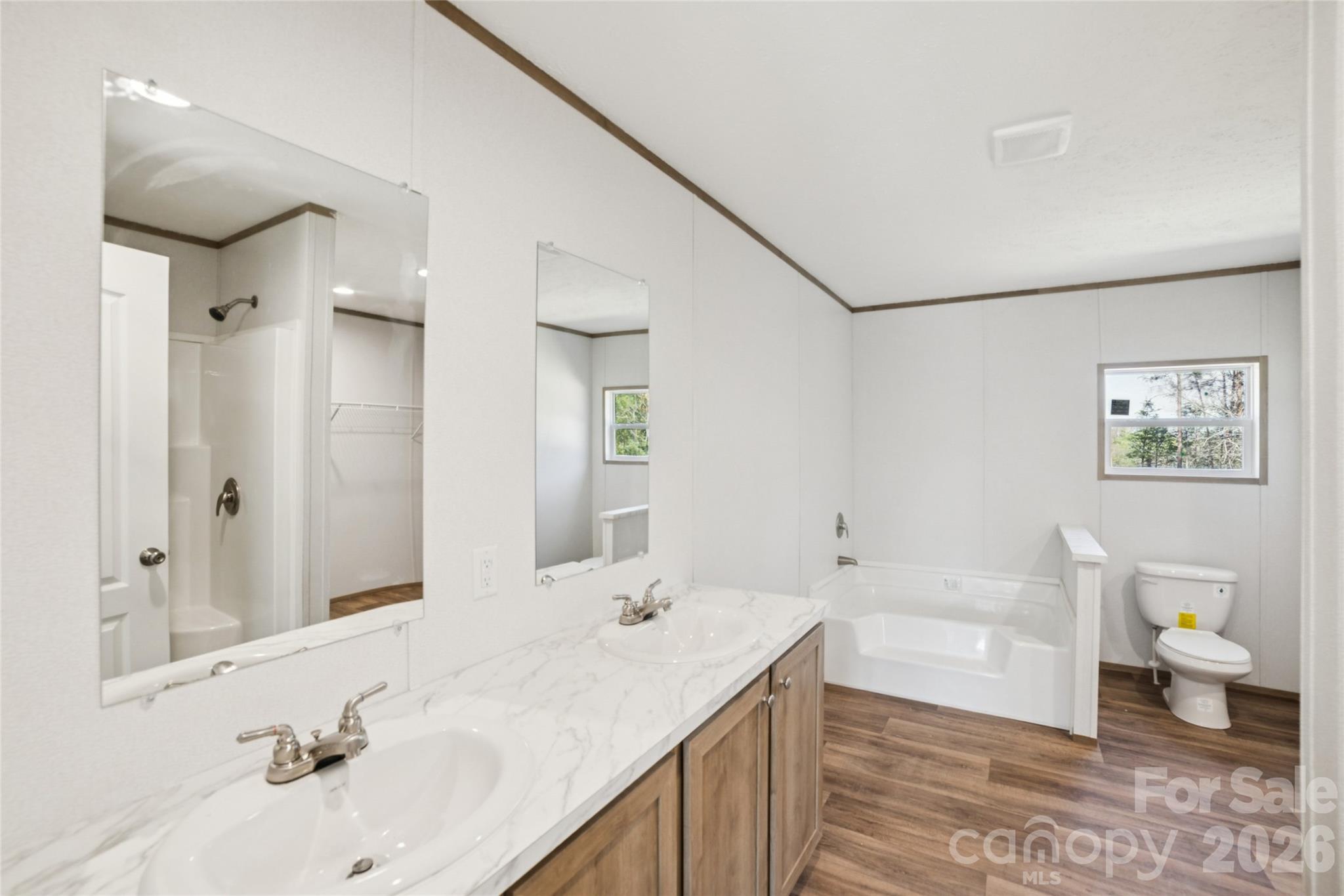 5350 Hope Road Vale, NC 28168 - Photo 15 of 24 a bathroom with a tub sink and a mirror