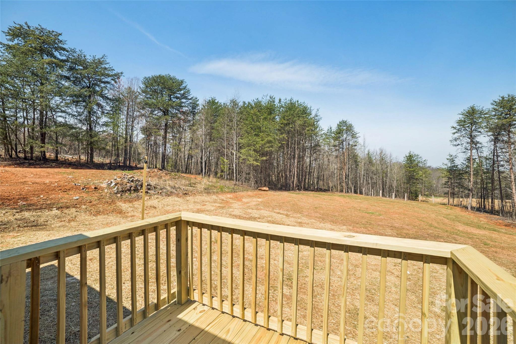 5350 Hope Road Vale, NC 28168 - Photo 21 of 24 a view of a yard with trees in the background