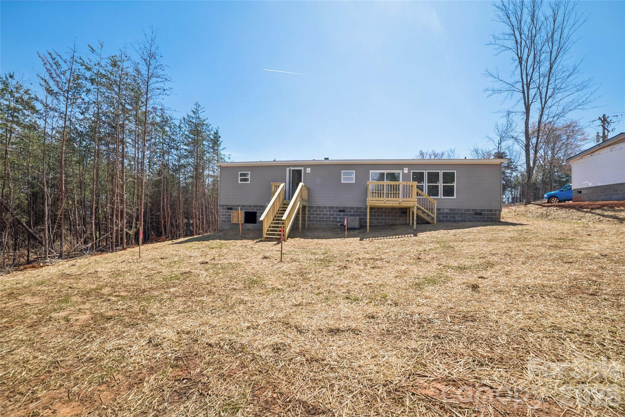 5350 Hope Road Vale, NC 28168 - Photo 24 of 24 a wooden house with a outdoor space