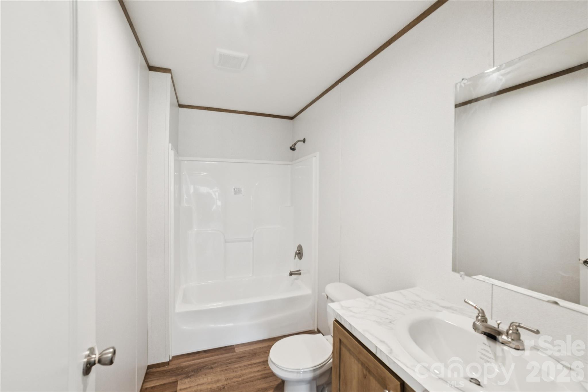 5350 Hope Road Vale, NC 28168 - Photo 10 of 24 a bathroom with a sink toilet vanity and shower