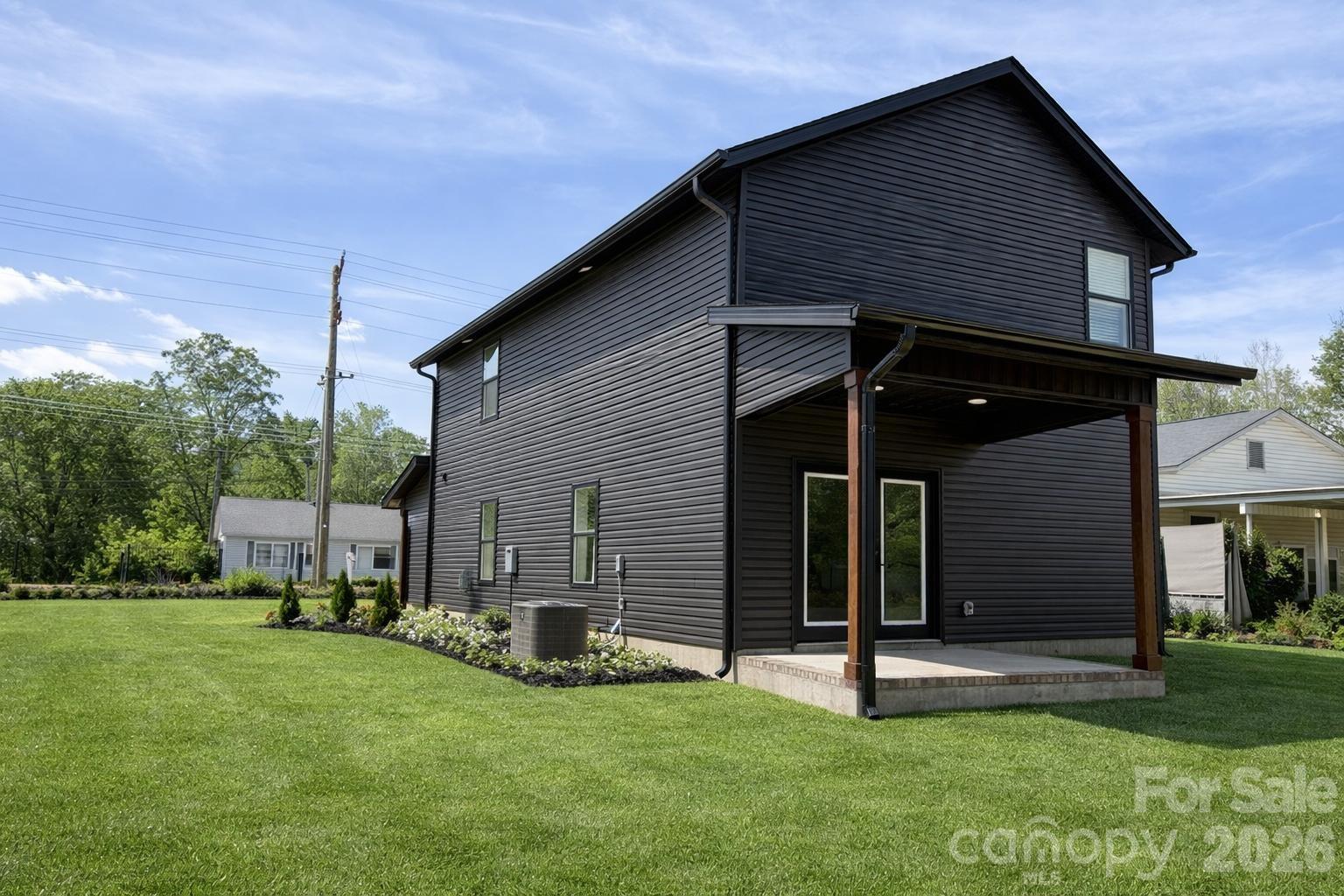 654 Bostian Road China Grove, NC 28023 - Photo 16 of 17 a view of a house with backyard and porch