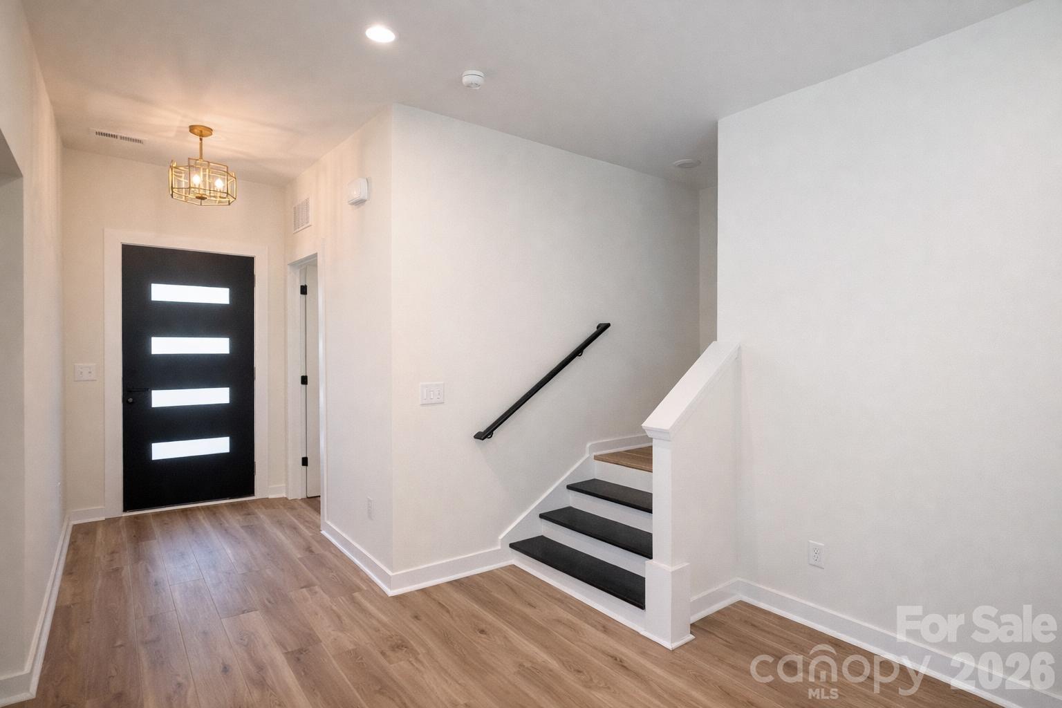 654 Bostian Road China Grove, NC 28023 - Photo 4 of 17 a view of entryway with wooden floor