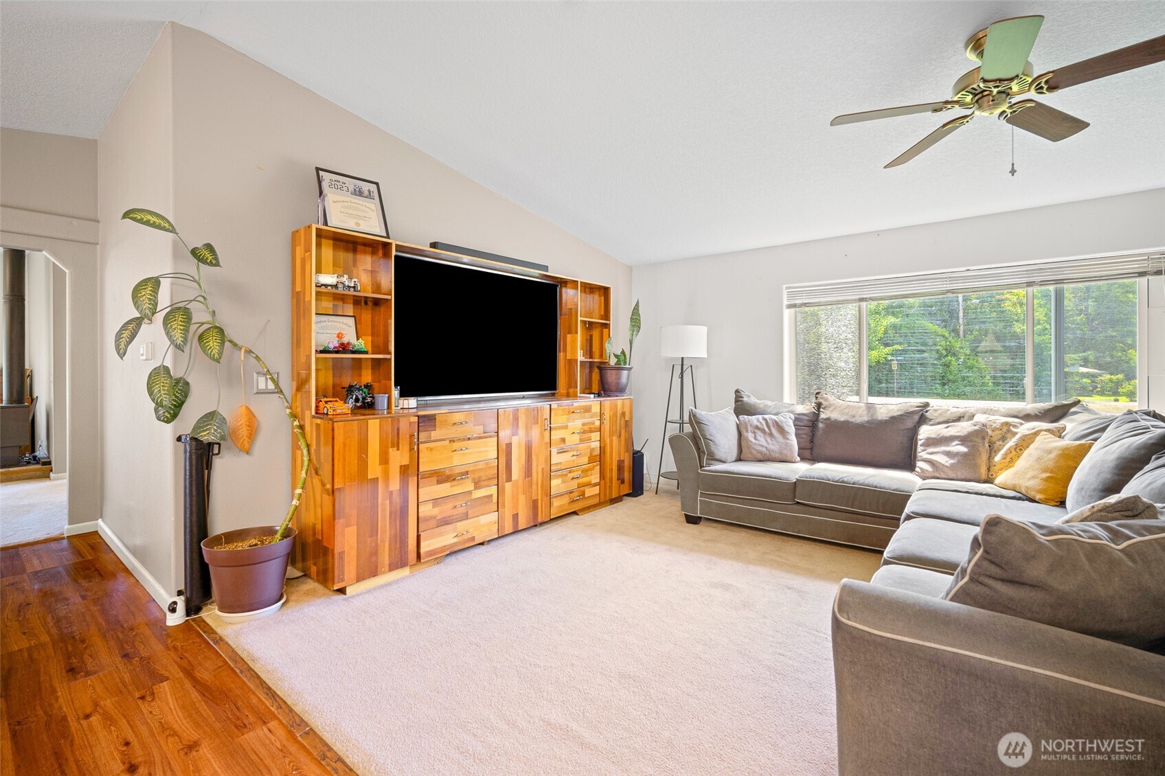 4230 Cody Road Blaine, WA 98230 - Photo 9 of 38 a living room with furniture and a flat screen tv