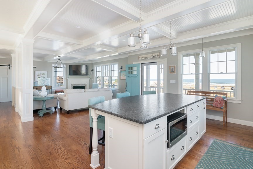 10 Whitehead Avenue Hull, MA 02045 - Photo 11 of 37 a kitchen with a stove a sink and a refrigerator