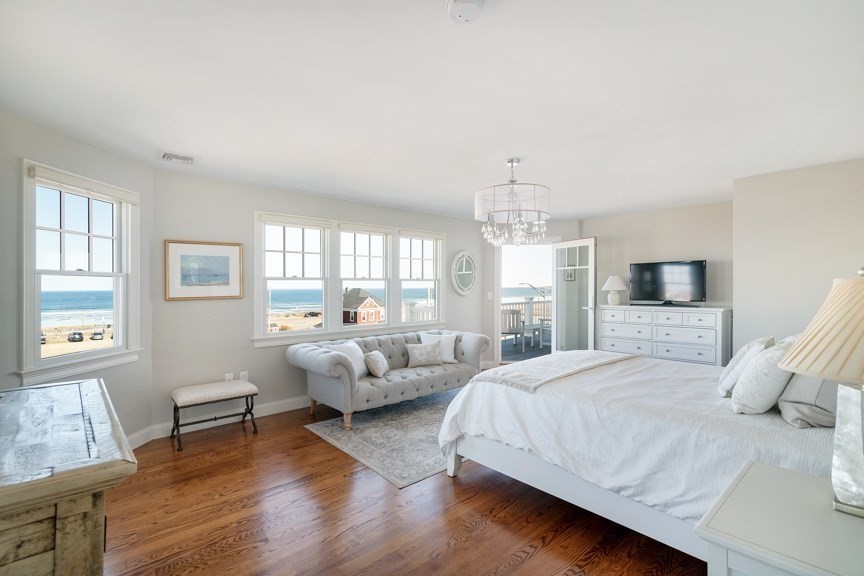 10 Whitehead Avenue Hull, MA 02045 - Photo 15 of 37 a spacious bedroom with a bed and wooden floor