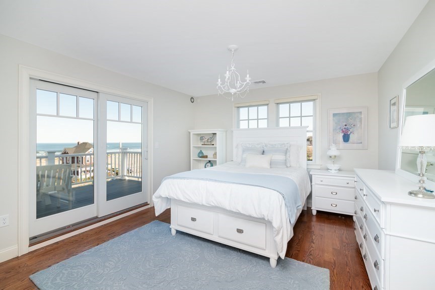 10 Whitehead Avenue Hull, MA 02045 - Photo 20 of 37 a spacious bedroom with a bed and large window