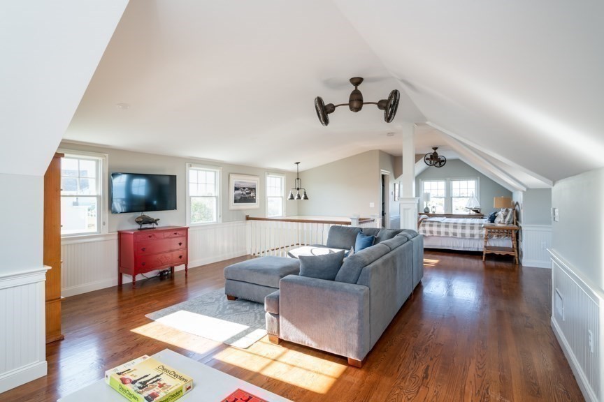 10 Whitehead Avenue Hull, MA 02045 - Photo 22 of 37 a living room with furniture and a flat screen tv