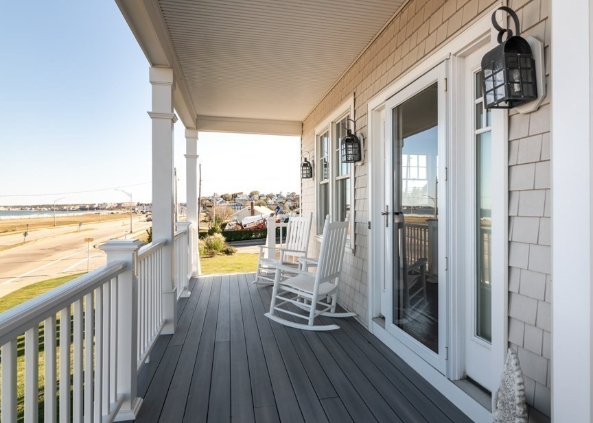 10 Whitehead Avenue Hull, MA 02045 - Photo 29 of 37 a view of a balcony with wooden floor and outdoor space