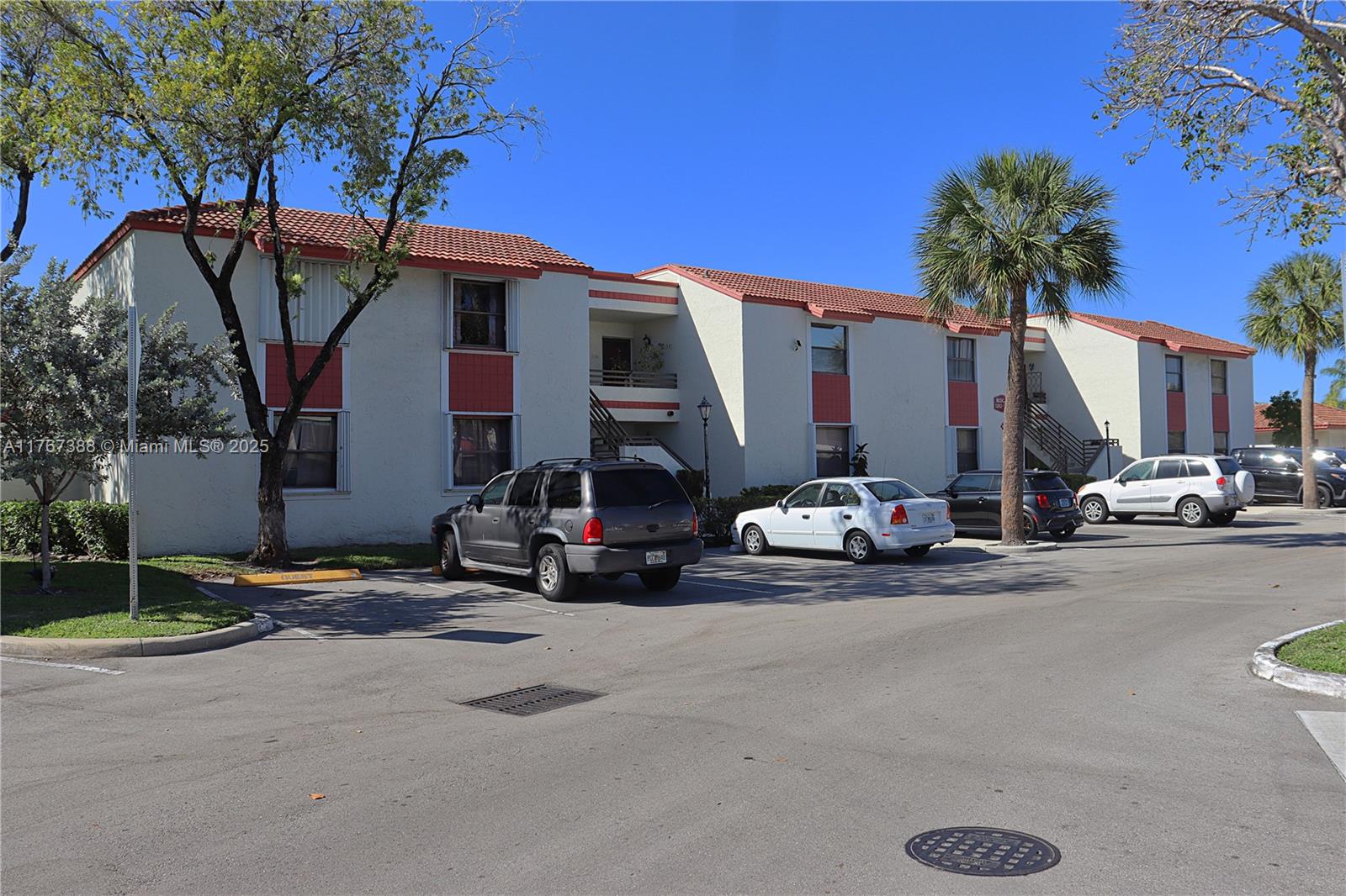 a view of a street with cars