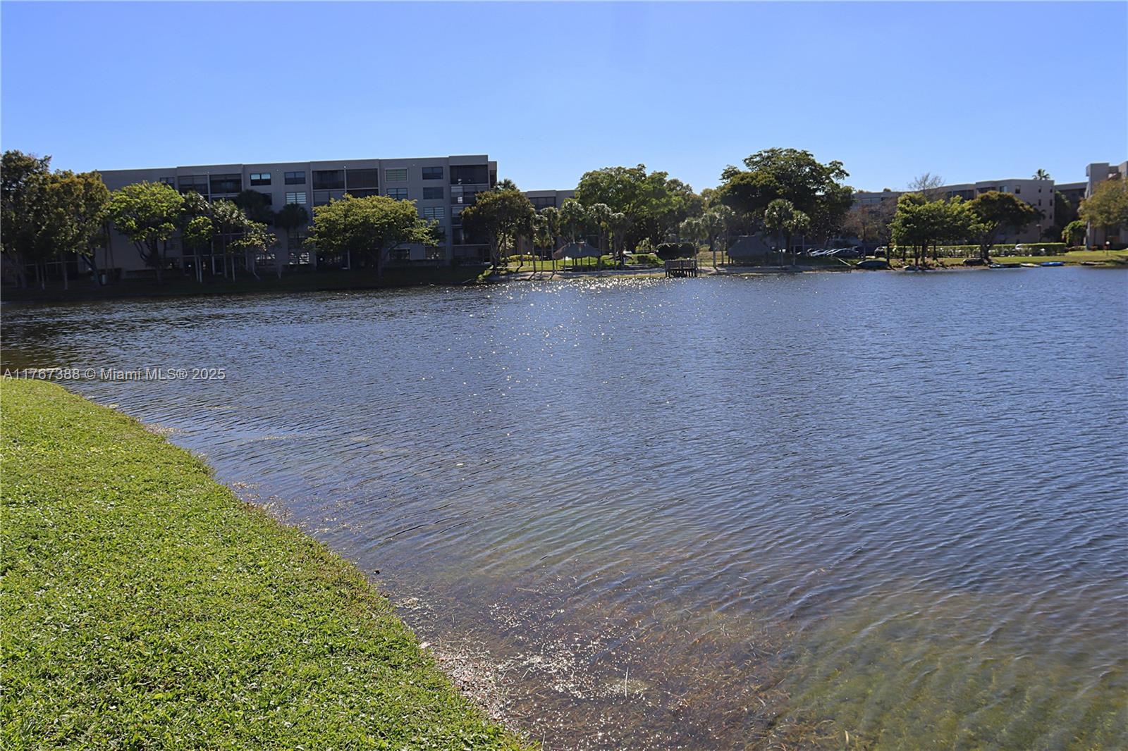 1206 North Hiatus Road, Unit 1206 Pembroke Pines, FL 33026 - Photo 3 of 18 a view of a lake