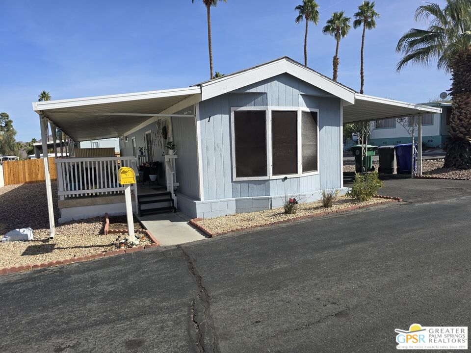 1 Running H Palm Desert, CA 92260 - Photo 1 of 22 a front view of a building with street