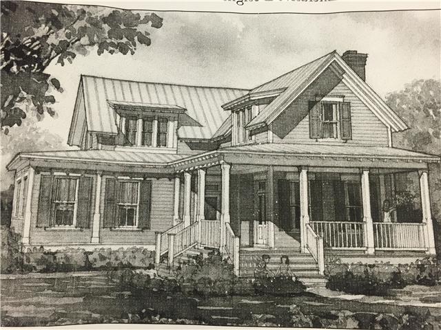 232 B S Road Cottontown, TN 37048 - Photo 1 of 2 a front view of a house with iron fence