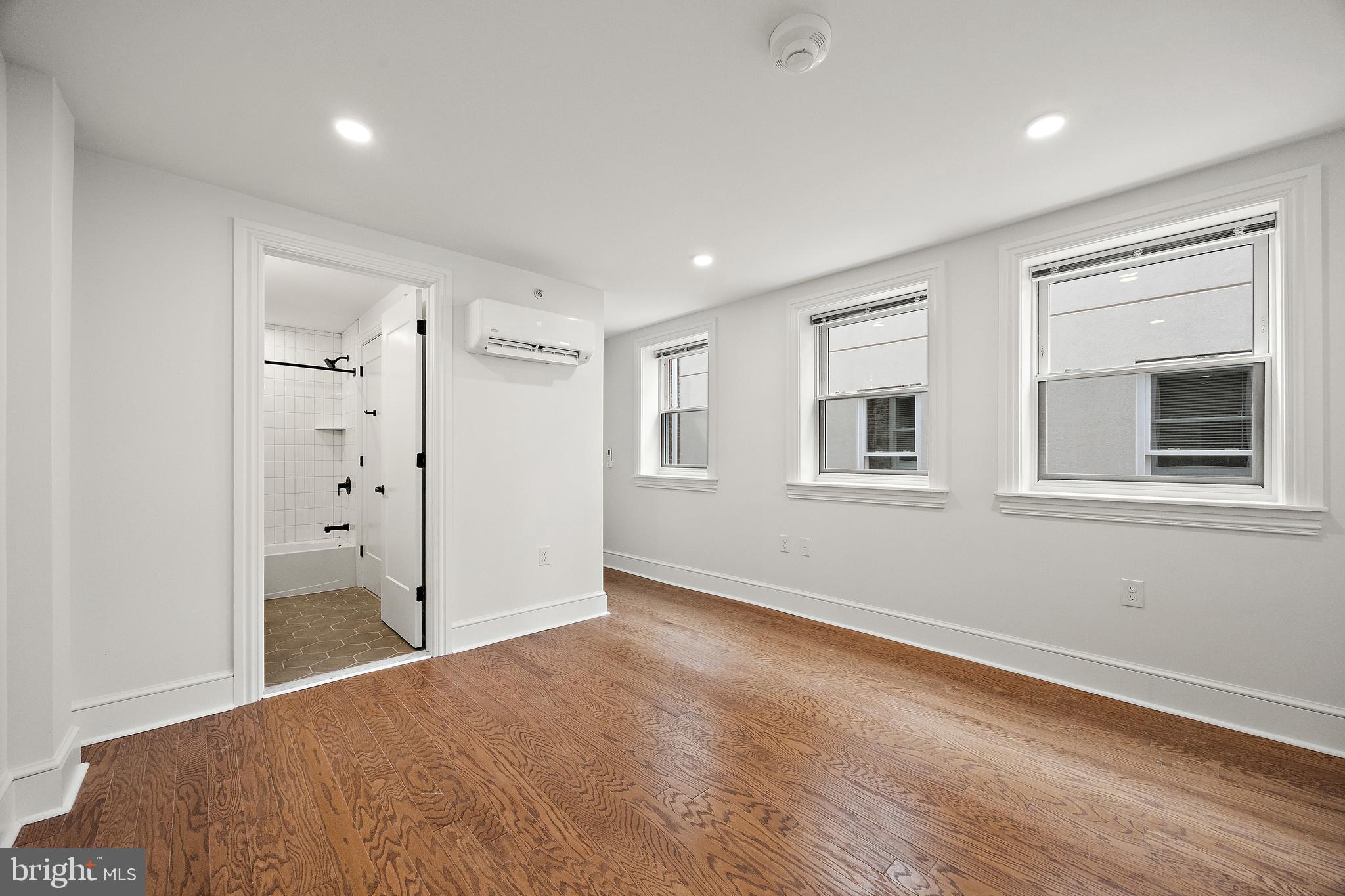 839-841 North Tatnall Street, Unit 201 Wilmington, DE 19801 - Photo 5 of 11 a view of an empty room with a window