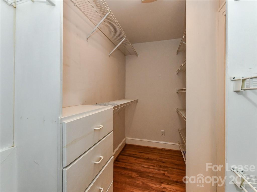 1923 Ewing Avenue Charlotte, NC 28203 - Photo 31 of 39 a utility room with cabinets washer and dryer