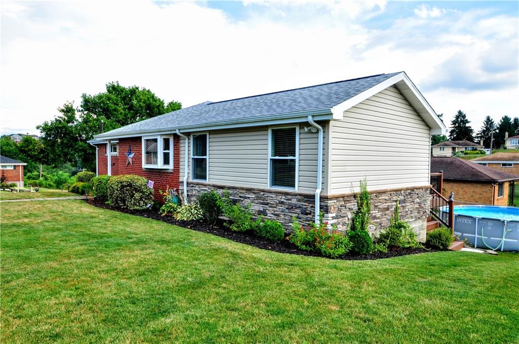 99 Thorncrest Drive McKees Rocks, PA 15136 - Photo 4 of 41 a view of a house with garden and yard