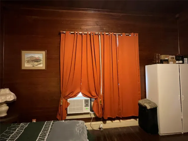 a view of a storage & utility room with a window