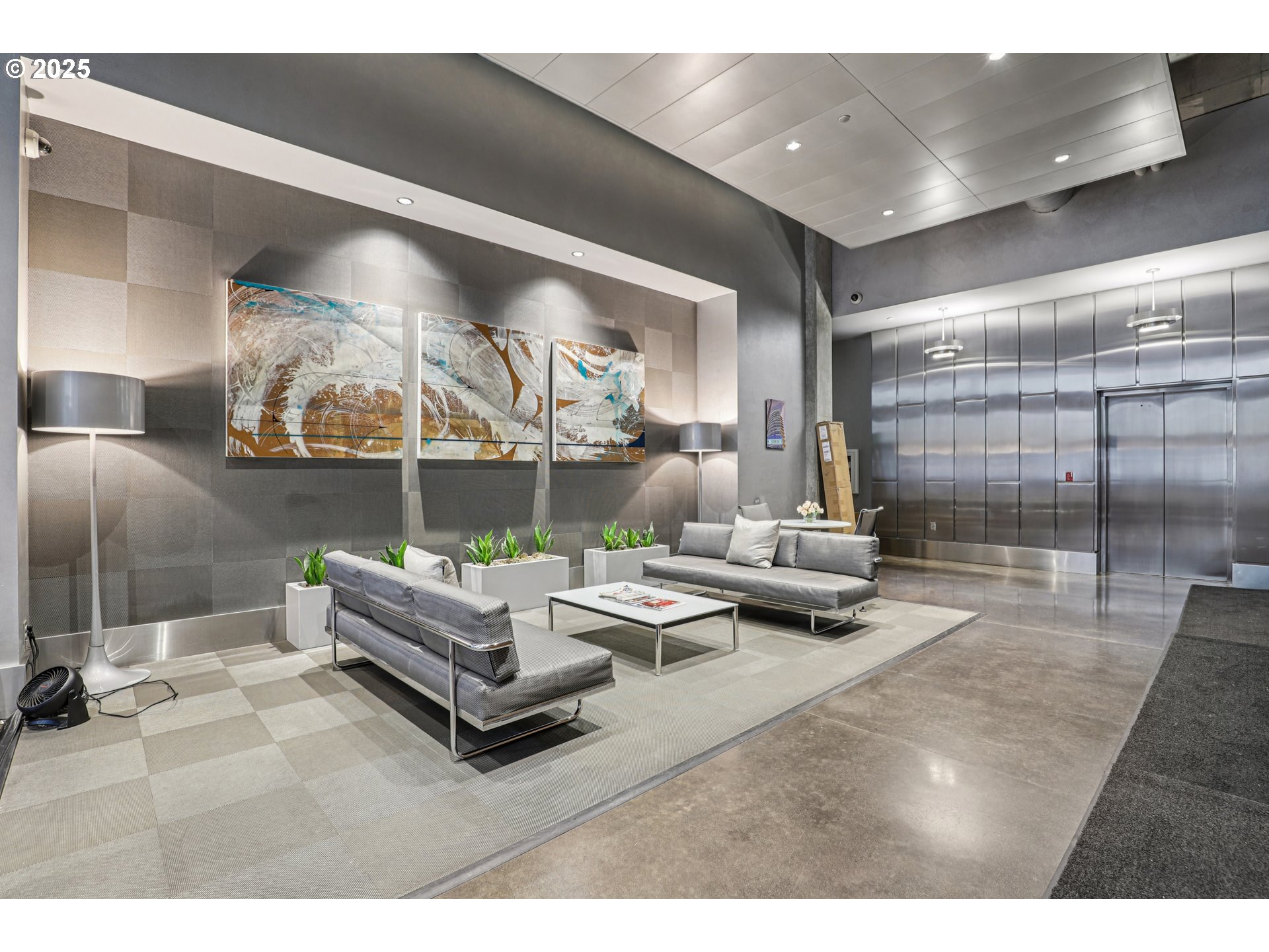 1926 West Burnside Street, Unit 906 Portland, OR 97209 - Photo 5 of 26 a living room with furniture