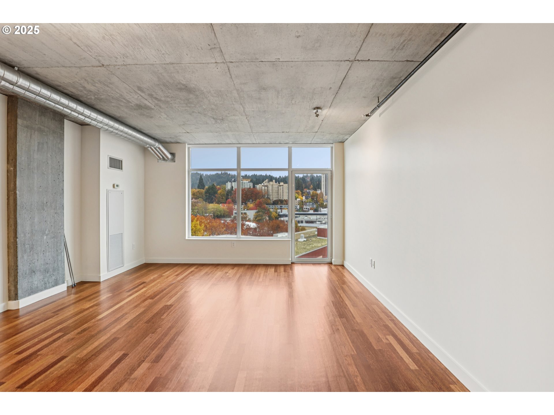 1926 West Burnside Street, Unit 906 Portland, OR 97209 - Photo 8 of 26 a view of hallway with window