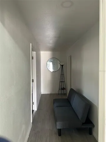 a bathroom with a shower and toilet