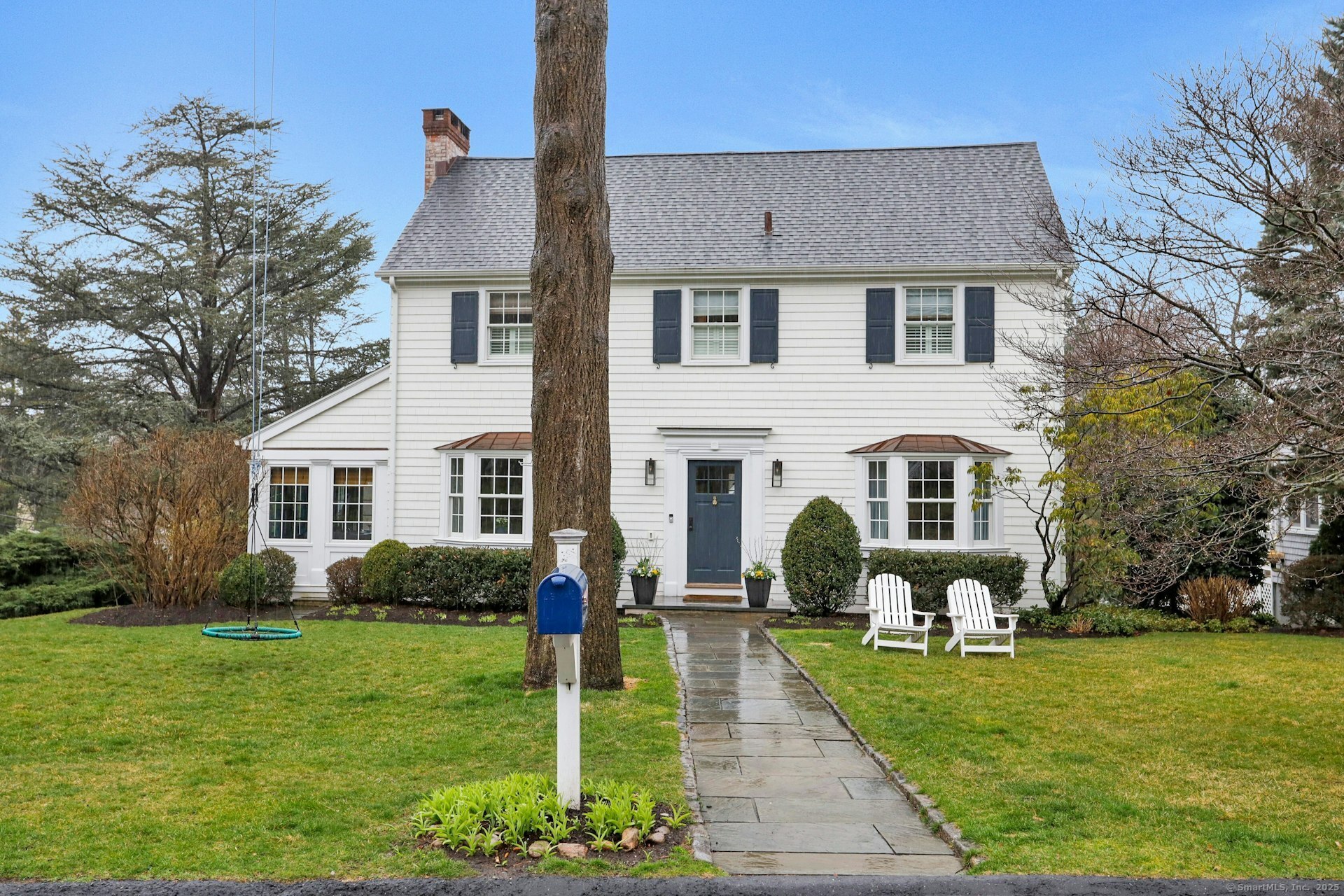6 Chester Road Darien, CT 06820 - Photo 1 of 1 a front view of house with yard and green space