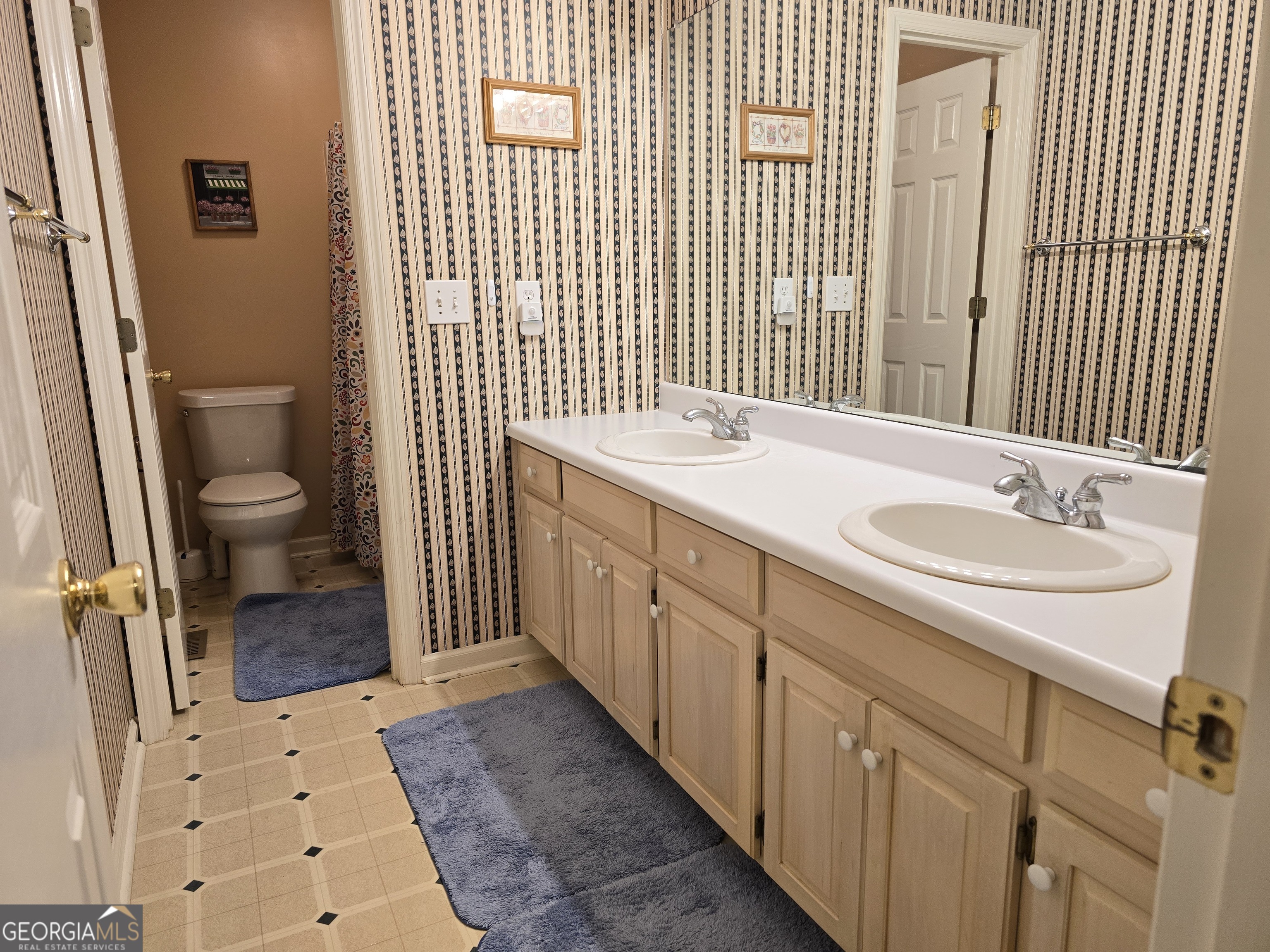 107 Ember Way LaGrange, GA 30240 - Photo 18 of 36 a bathroom with a sink a toilet and shower