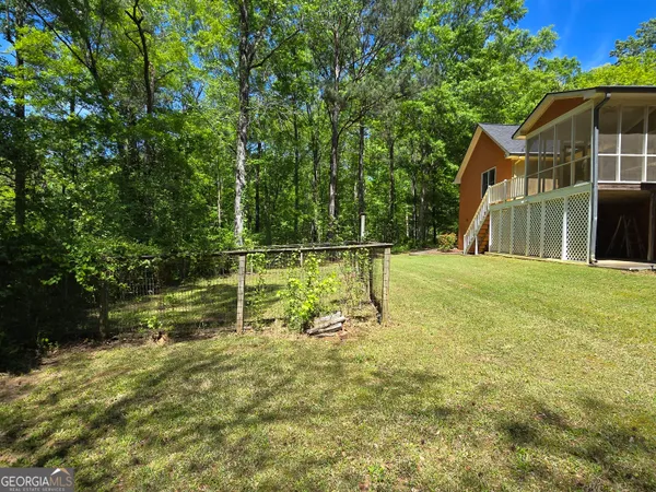 a view of a house with a park