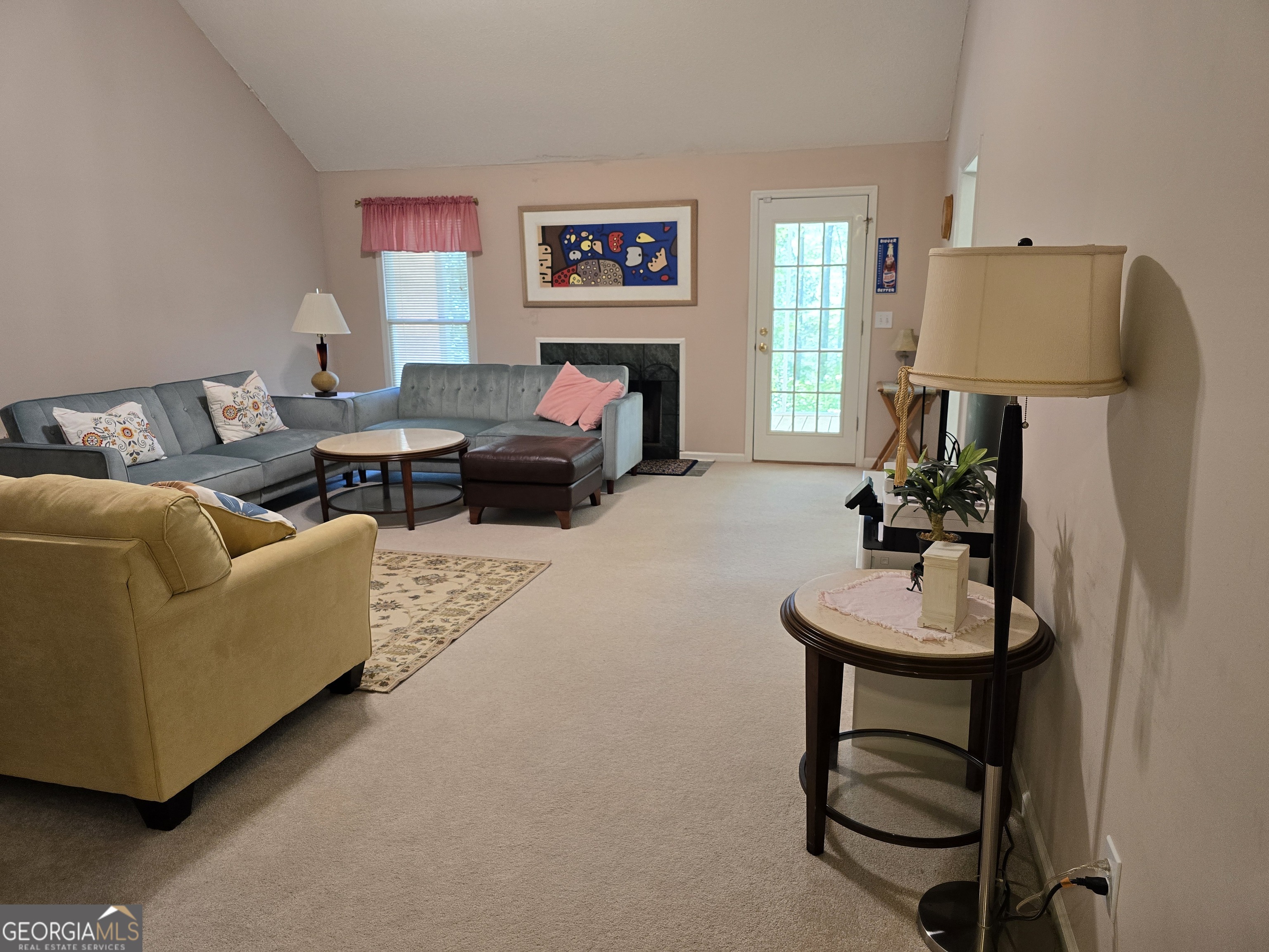 107 Ember Way LaGrange, GA 30240 - Photo 7 of 36 a living room with furniture and a fireplace