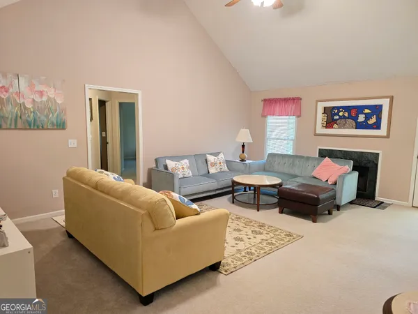 a living room with furniture and a couch