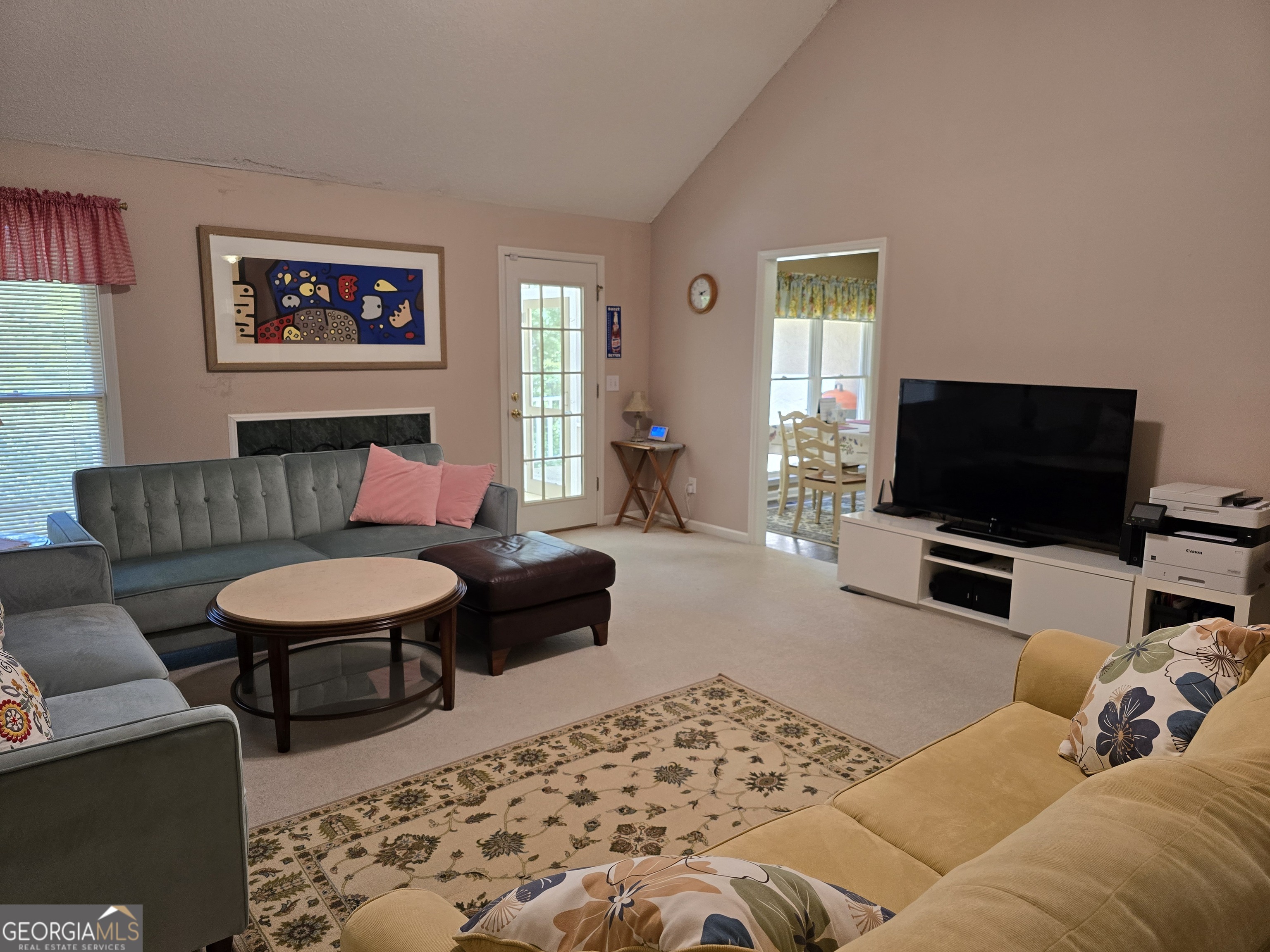 107 Ember Way LaGrange, GA 30240 - Photo 9 of 36 a living room with furniture and a flat screen tv