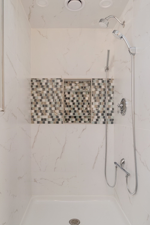 21 Berkeley Street Somerville, MA 02143 - Photo 30 of 36 a bathroom with a shower