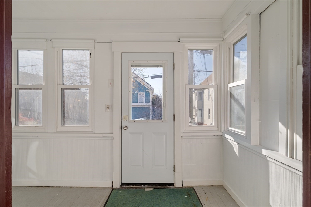21 Berkeley Street Somerville, MA 02143 - Photo 33 of 36 view of an entryway with wooden floor